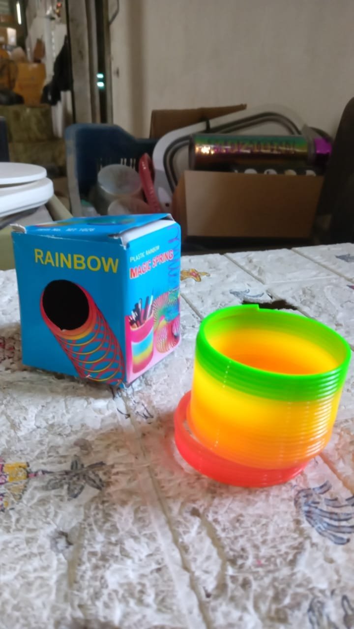 Rainbow Slinky Spring Toy – Compact, Portable Fun Toy for Kids & Adults, Great for Birthdays (1 Pc) - Image 7
